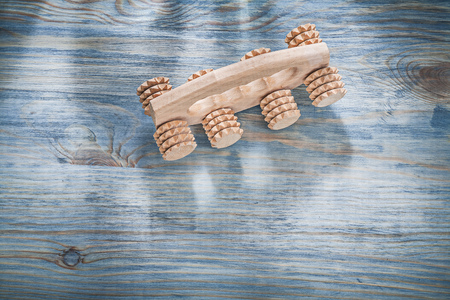 Wooden massager on wood board healthcare concept.の写真素材