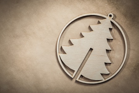 Vintage wood Christmas tree on paper background celebrations concept.の写真素材