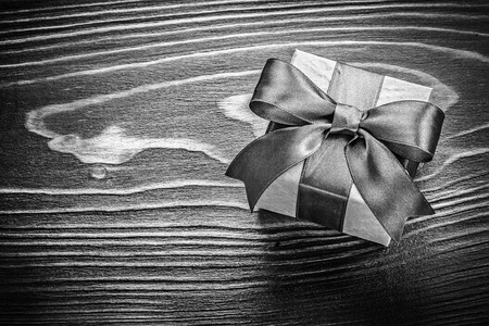 Gift box on wooden board holidays concept.の写真素材
