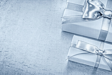 Set of wrapped present boxes on metallic background celebrations concept.の写真素材