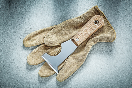 Plastering trowel safety gloves on concrete surface construction concept.の写真素材