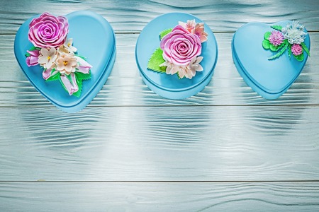 Set of blue gift boxes on wooden board holidays concept.