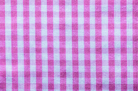 Pink checked cotton table cloth top view.の写真素材