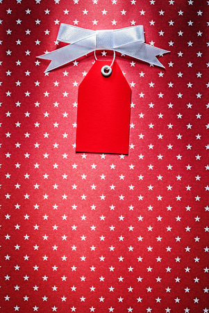 Pricetag on red fabric top view shopping concept.の写真素材