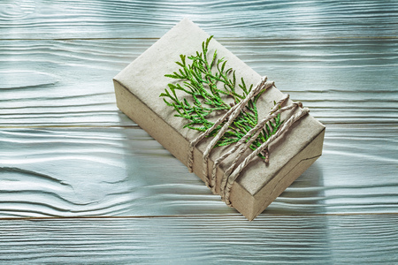 Corded handmade present box with thuya branch horizontal view.の写真素材