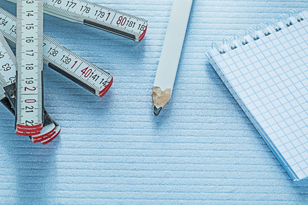 Notebook pencil tape measure construction concept.の写真素材