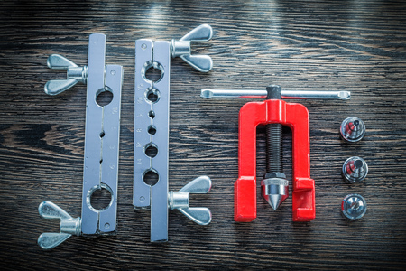 Flaring clamp brake plumber on wooden board.の写真素材