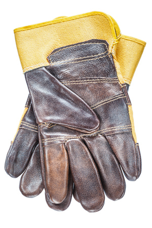 Brown safety gloves isolated on white.の写真素材