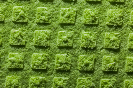 New green kitchen washcloth surface.の写真素材