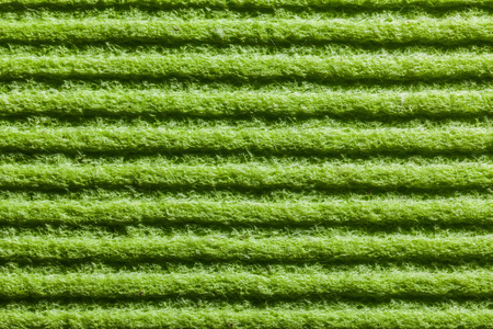 New green dishwashing cloth horizontal view.の写真素材