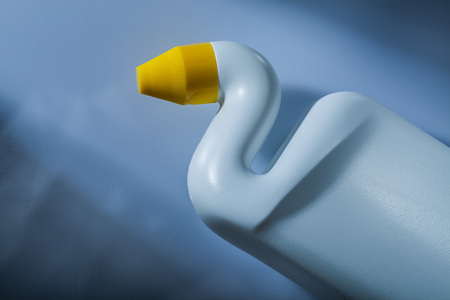 Plastic cleaning bottle on white background.