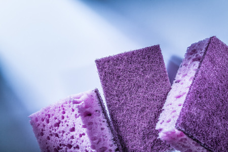 New dishwashing sponges on white background.