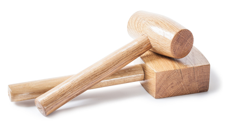 two wooden mallets woodworkers tools isolated on white bavkground