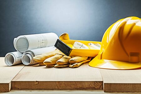 construction blueprints gloves level helmetの写真素材