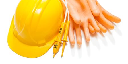 helmet dielectric gloves and electric tester isolatedの写真素材