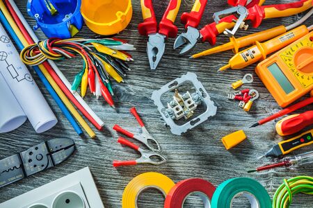 electrical tools set on vintage wood backgroundの写真素材