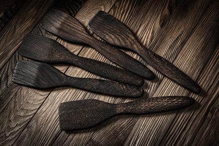Vintage Wooden Kitchen Spatulla Set On Wood Backgroundの写真素材