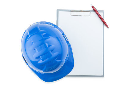 Blue Construction Helmet And Clipboard Isolatedの写真素材