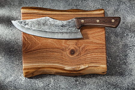 Meat Knife Damascus Steel On Vintage Kitchen Boardの写真素材
