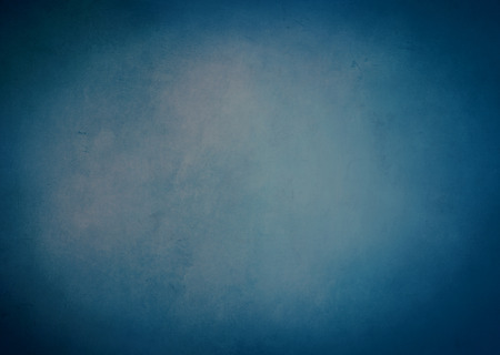 Deep blue grungy background textureの写真素材