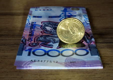 Dollar lies on tenge banknotes
