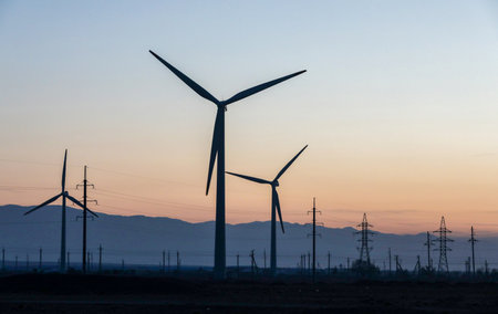 Wind power plant near a village in Kazakhstanの写真素材
