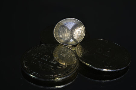 Coins on a black background. Currency.
