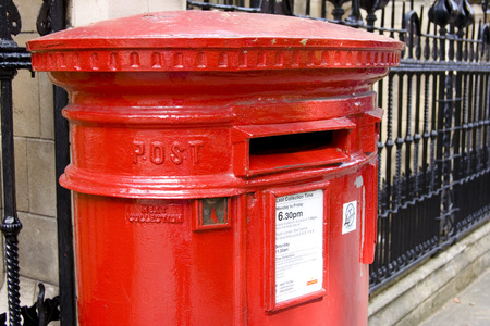 Red mail collecting street box, traditional for Britainの写真素材