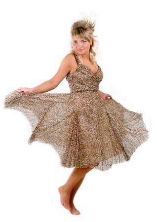 Dancing seductive young woman in leopard dressの写真素材