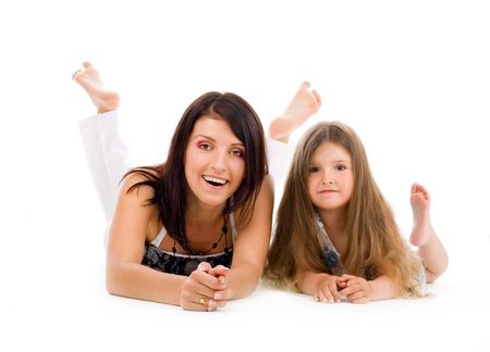Happy young mother and daughter on isolated backgroundの写真素材
