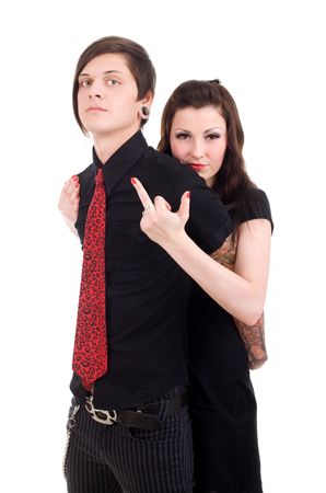 Young emo couple on isolated white backgroundの写真素材