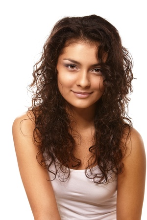 Closeup portrait of young girl over isolated white backgroundの写真素材