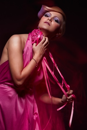 Mixed light fashion portrait of young attractive womanの写真素材