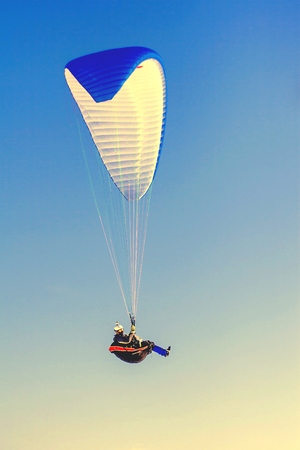 paraglider in sky isolatedの写真素材