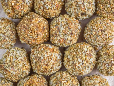 Top view of Low-fat energy balls with nuts on paperの写真素材