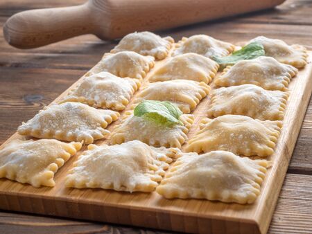 Fresh Homemade Ravioli on Wooden Backgroundの写真素材
