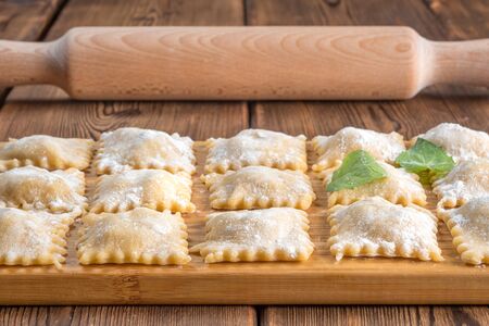 Perspective View of Fresh Homemade Ravioli on Wooden Background. Soft focus.の写真素材