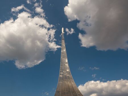 Saratov Region, Russia - May 8, 2019. Detail of the Monument to the landing site of the first in the world cosmonaut Yuri Gagarin. Rocket looking into the sky.のeditorial素材