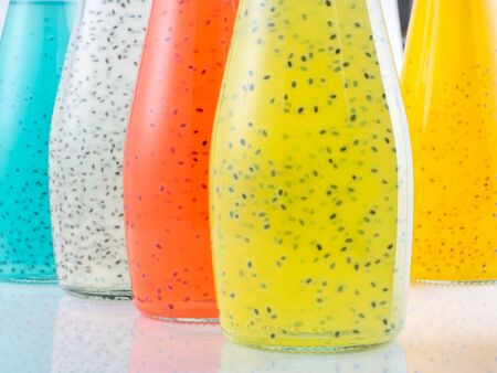 Close up view of bottles of Basil Seed beverage.の写真素材
