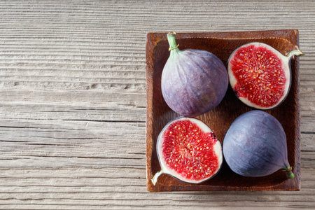 A set of four figs one has been slicedの写真素材