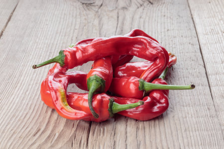 Chili pepper on a gray wooden background.の写真素材