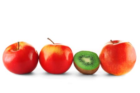 Red apples and green kiwi sliceの写真素材