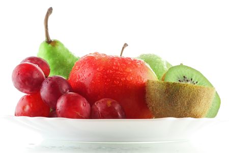 Wet fruits on plateの写真素材
