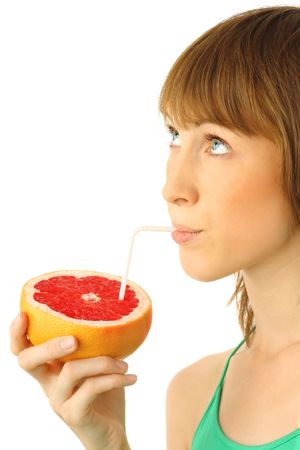 Young woman with grapefruitの写真素材