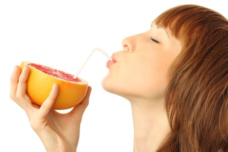 Young woman with ripe fruitの写真素材