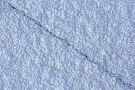 Blue snow texture with crackの写真素材