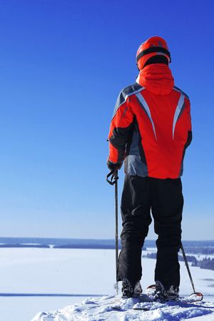 Rider standing on hillの写真素材