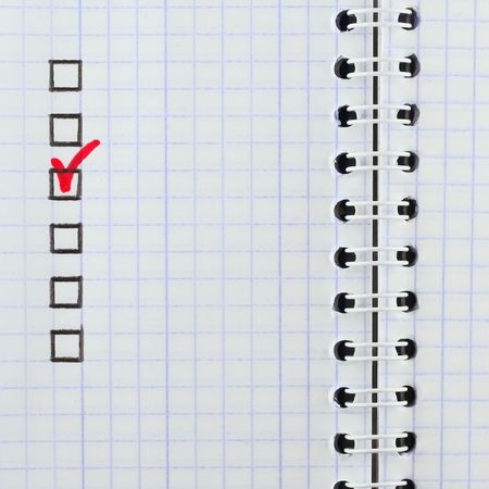 Blank notebook with red markの写真素材