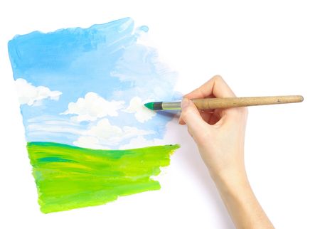 Hand with brush drawing a pictureの写真素材