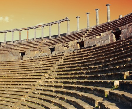 Ancient theater with columns and red skyの写真素材